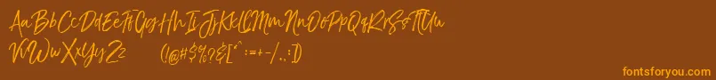 TheBraggestDemo Font – Orange Fonts on Brown Background