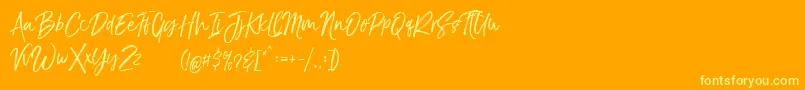 TheBraggestDemo Font – Yellow Fonts on Orange Background