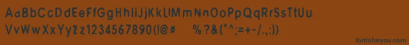 M6Universelle Font – Black Fonts on Brown Background