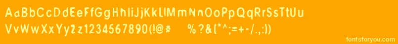 M6Universelle Font – Yellow Fonts on Orange Background
