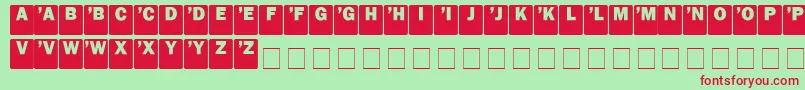 DcSans Font – Red Fonts on Green Background