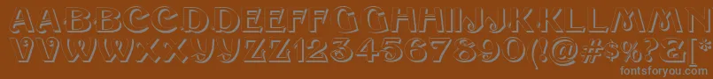 SesameShadow-fontti – harmaat kirjasimet ruskealla taustalla