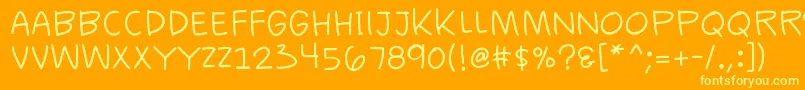K26casualcomics-fontti – keltaiset fontit oranssilla taustalla