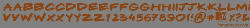 Komix Font – Brown Fonts on Gray Background
