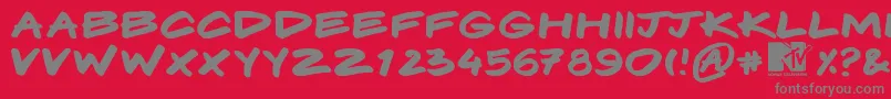 Komix-Schriftart – Graue Schriften auf rotem Hintergrund