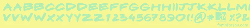 Komix Font – Green Fonts on Yellow Background