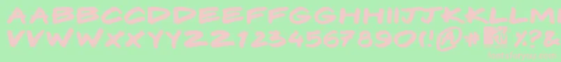 Komix Font – Pink Fonts on Green Background