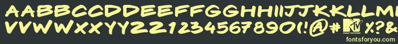 Komix Font – Yellow Fonts on Black Background