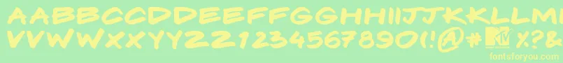 Komix Font – Yellow Fonts on Green Background