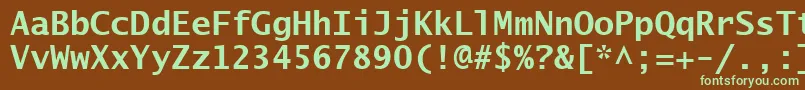 フォントLucidaSansTypewriterBold – 緑色の文字が茶色の背景にあります。