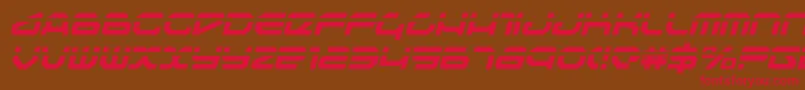 フォントTravelerli – 赤い文字が茶色の背景にあります。