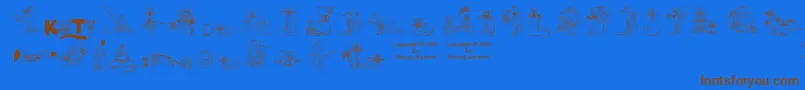 Kociesymbole-Schriftart – Braune Schriften auf blauem Hintergrund