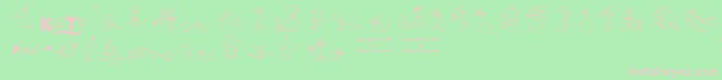 Kociesymbole Font – Pink Fonts on Green Background