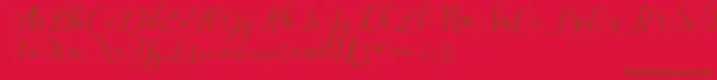 ClaudiaScript Font – Brown Fonts on Red Background
