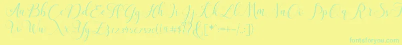 フォントClaudiaScript – 黄色い背景に緑の文字