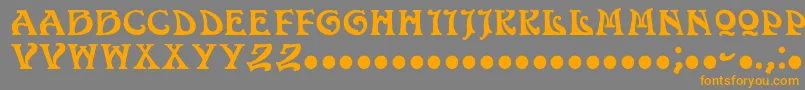 フォントVolan – オレンジの文字は灰色の背景にあります。