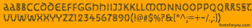 Studzstd-Schriftart – Schwarze Schriften auf orangefarbenem Hintergrund