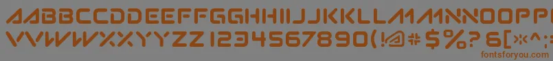 フォントSubatomic.Tsoonami – 茶色の文字が灰色の背景にあります。