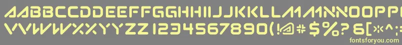 Subatomic.Tsoonami-Schriftart – Gelbe Schriften auf grauem Hintergrund