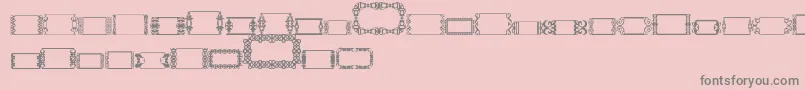 SlButton2-fontti – harmaat kirjasimet vaaleanpunaisella taustalla