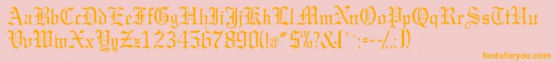 フォントGargoylessk – オレンジの文字がピンクの背景にあります。