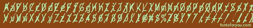 フォントBptypewritedamagedslashed – 緑色の文字が茶色の背景にあります。