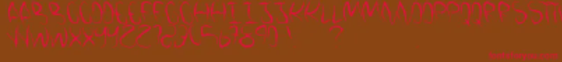 VamosALaPlaya Font – Red Fonts on Brown Background