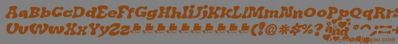 Czcionka JAirplaneSwashItalicFont – brązowe czcionki na szarym tle