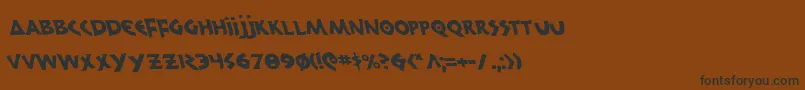 フォント300TrojansLeftalic – 黒い文字が茶色の背景にあります