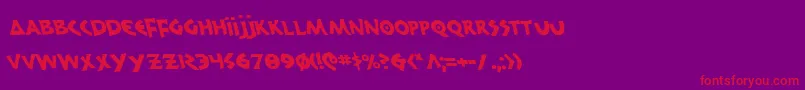 フォント300TrojansLeftalic – 紫の背景に赤い文字