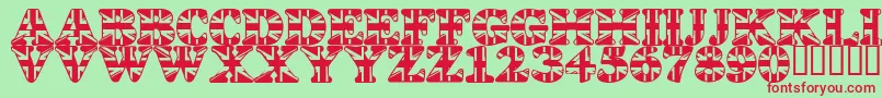 LmsGodSaveTheQueen-Schriftart – Rote Schriften auf grünem Hintergrund
