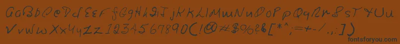 フォントRonsfont – 黒い文字が茶色の背景にあります