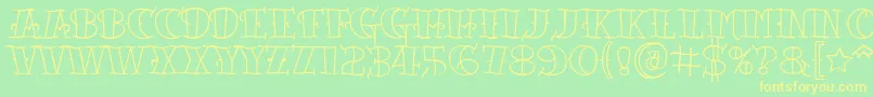 Tattooletteringopen Font – Yellow Fonts on Green Background