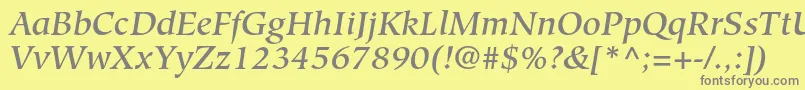 Fonte HiroshigestdMediumitalic – fontes cinzas em um fundo amarelo