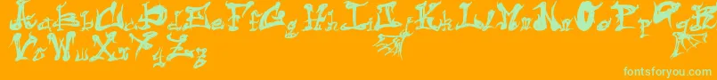 DarkFlame-Schriftart – Grüne Schriften auf orangefarbenem Hintergrund