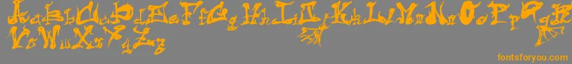 フォントDarkFlame – オレンジの文字は灰色の背景にあります。