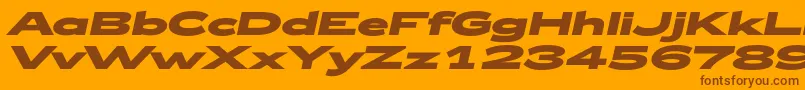 Zeppelin53BoldItalic-Schriftart – Braune Schriften auf orangefarbenem Hintergrund