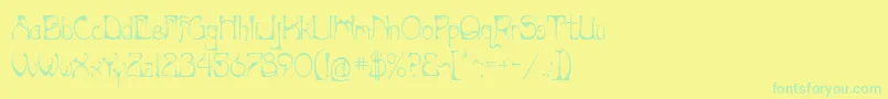フォントArtnouv – 黄色い背景に緑の文字