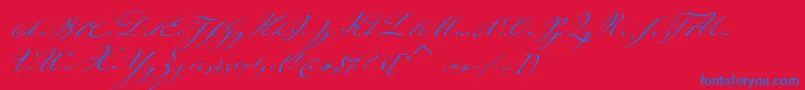 JohannsparklingitcTt-Schriftart – Blaue Schriften auf rotem Hintergrund