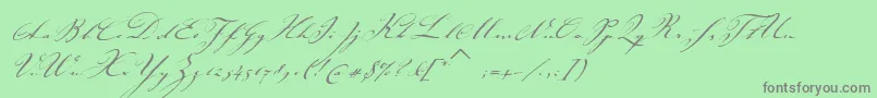 JohannsparklingitcTt-Schriftart – Graue Schriften auf grünem Hintergrund