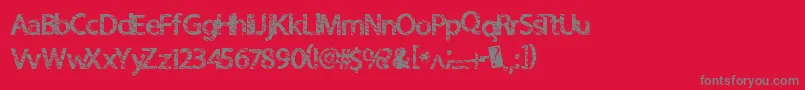 Quickcut-fontti – harmaat kirjasimet punaisella taustalla