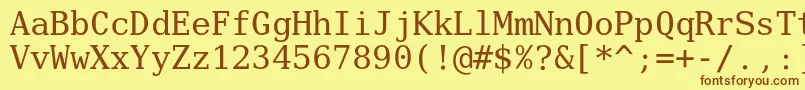 Шрифт Verilyserifmono – коричневые шрифты на жёлтом фоне