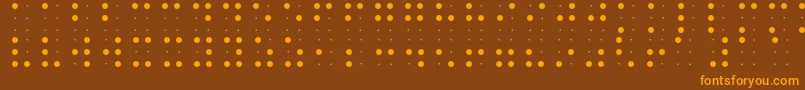 Czcionka BraileFont – pomarańczowe czcionki na brązowym tle