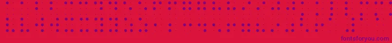 Czcionka BraileFont – fioletowe czcionki na czerwonym tle