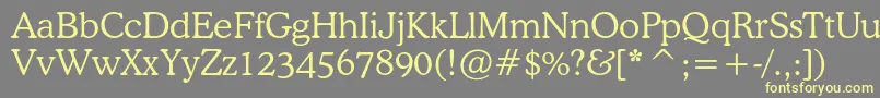 Cooperlightcbt-Schriftart – Gelbe Schriften auf grauem Hintergrund