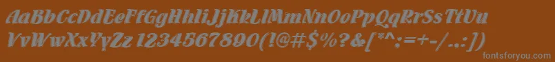 Fonte Flamencoinld – fontes cinzas em um fundo marrom