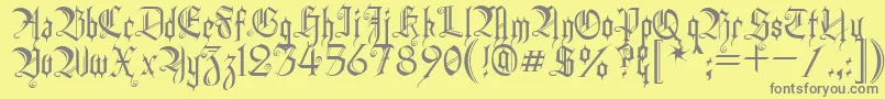 HeidornHill-fontti – harmaat kirjasimet keltaisella taustalla