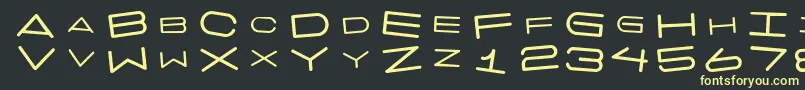 フォント7daysrotated – 黒い背景に黄色の文字