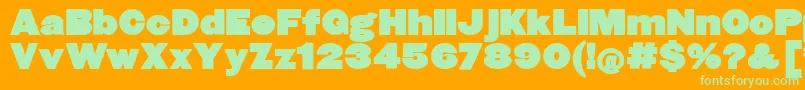 Fatsansround-Schriftart – Grüne Schriften auf orangefarbenem Hintergrund