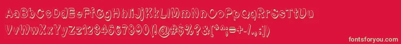 Czcionka Fontformerlyknownasfont – zielone czcionki na czerwonym tle